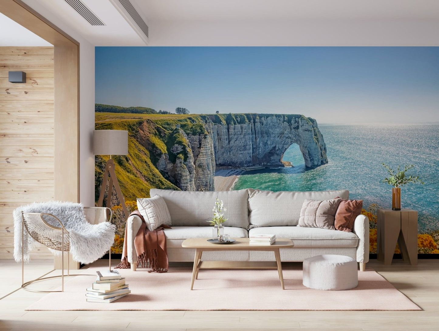 Etretat cliff arches wall mural with yellow blooms, green color shades and sea wallpaper waterline