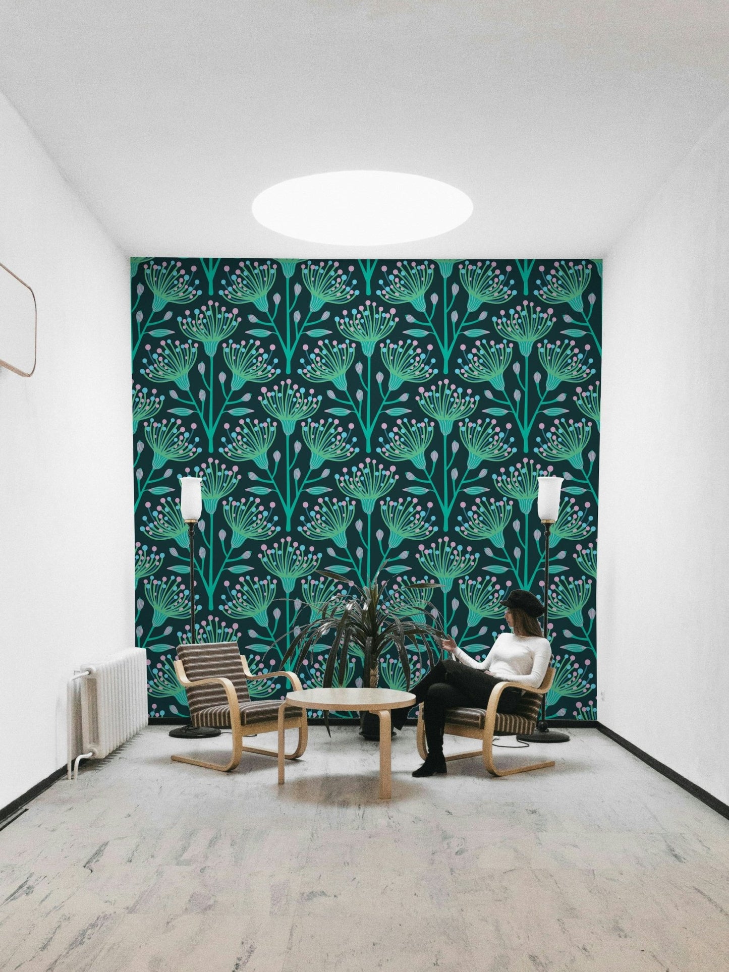 The eucalyptus and floral shapes are a central focus of the image.

