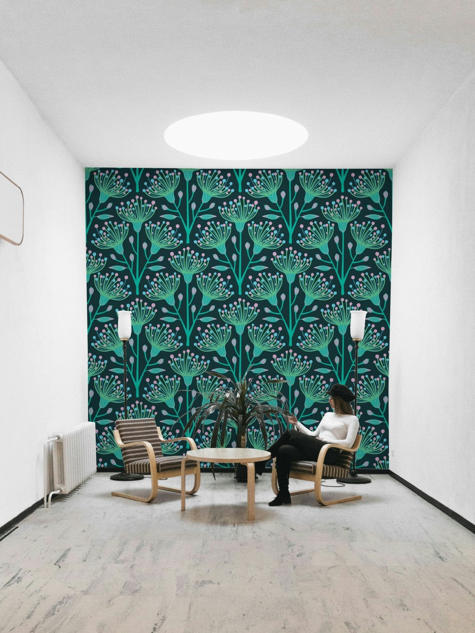 The eucalyptus and floral shapes are a central focus of the image.

