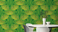 The colors are soft, muted tones of dark green, yellow, and orange on a lime green background.

