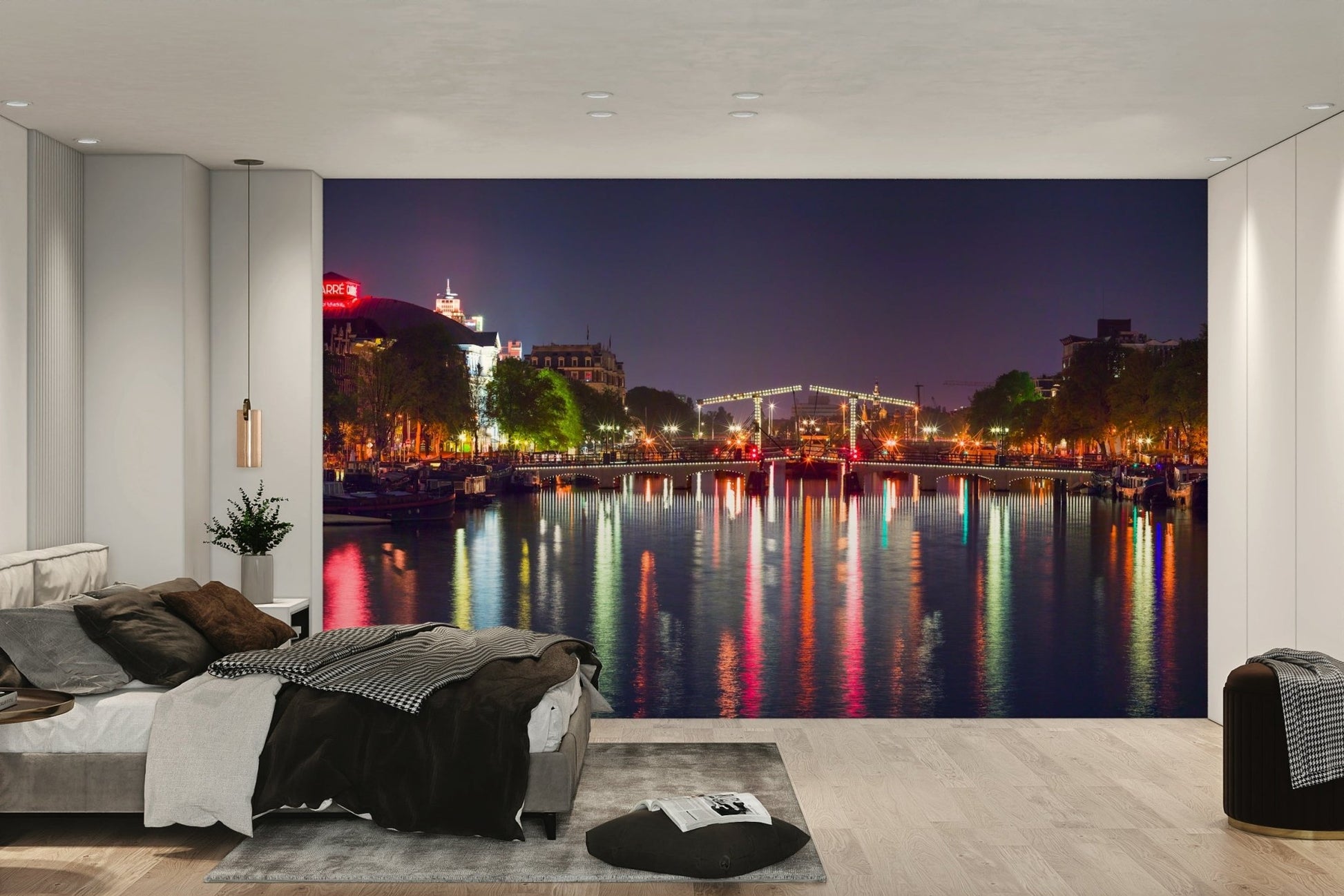 The mural is installed in a calm living room behind a simple, light-colored sofa.

