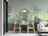 Exotic Paradise wallpaper mural of tropical trees and peacocks in soft green behind a wood dining table and chairs beside a beige sofa