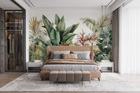 Exotic Greenery wallpaper mural of green palm leaves above a tan upholstered bed in a bedroom