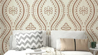 Classic ogee wallpaper in light mocha palette

