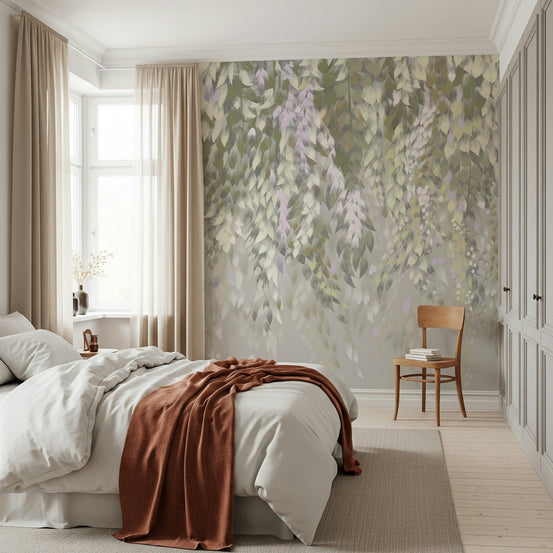 Falling Leaves Serenity wallpaper mural with soft green leaves behind a white bed and rust throw in a serene bedroom