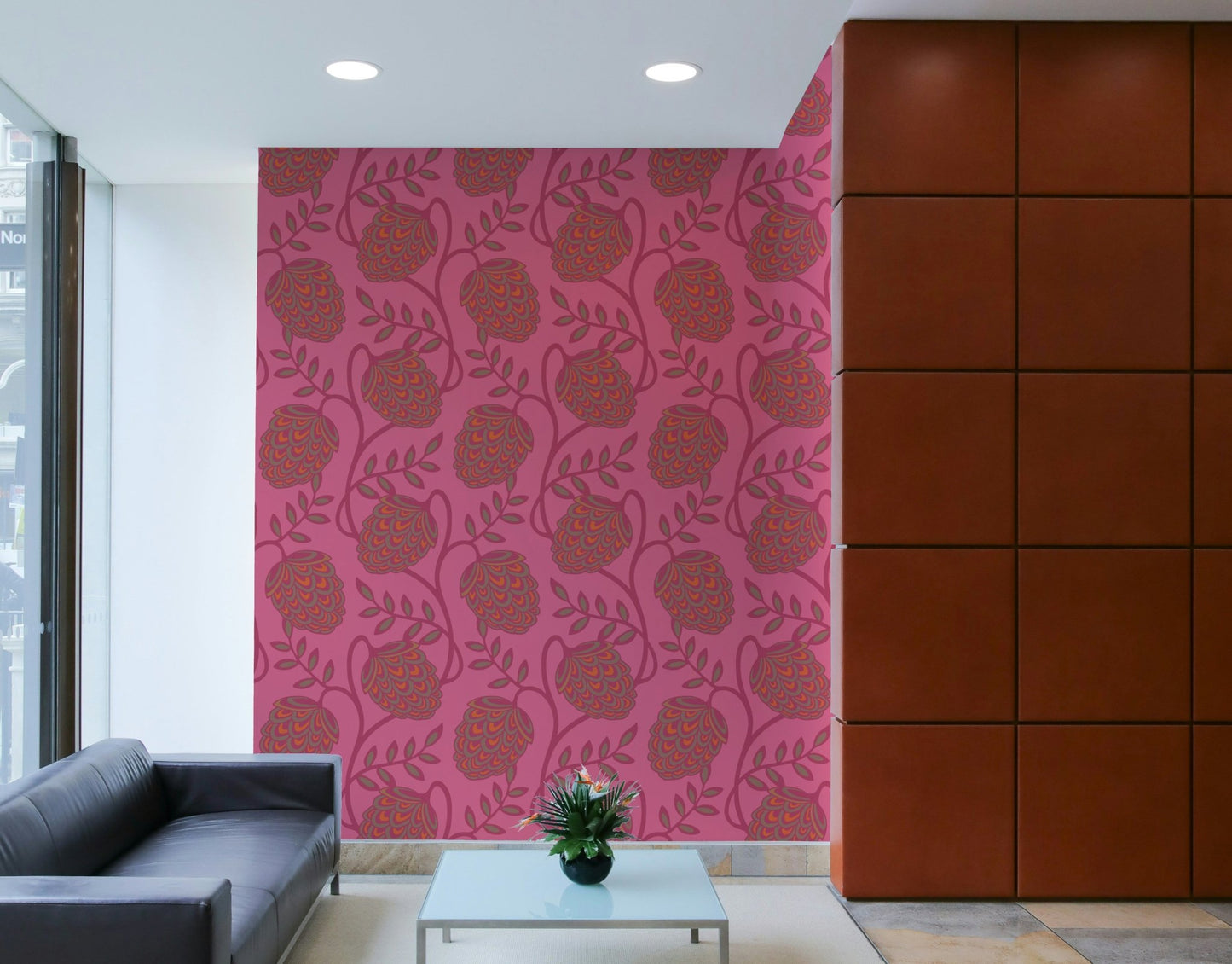 Bold botanical illustrations on wallpaper.

