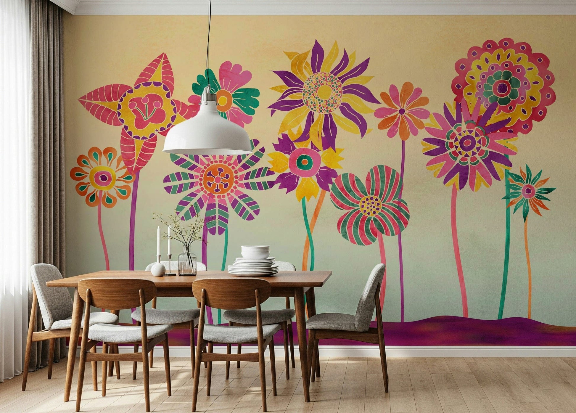 Whimsical Fantasy Flowers wallpaper mural of bold pink and yellow stylized blooms behind a wood dining table and grey chairs