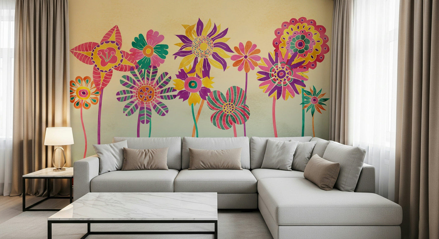Whimsical Fantasy Flowers wallpaper mural of bright flowers behind a grey sectional sofa and marble table in a living room