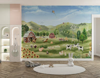 Farm Animals wallpaper with red barns, sunflowers and cows above a round rug in a bright kids playroom