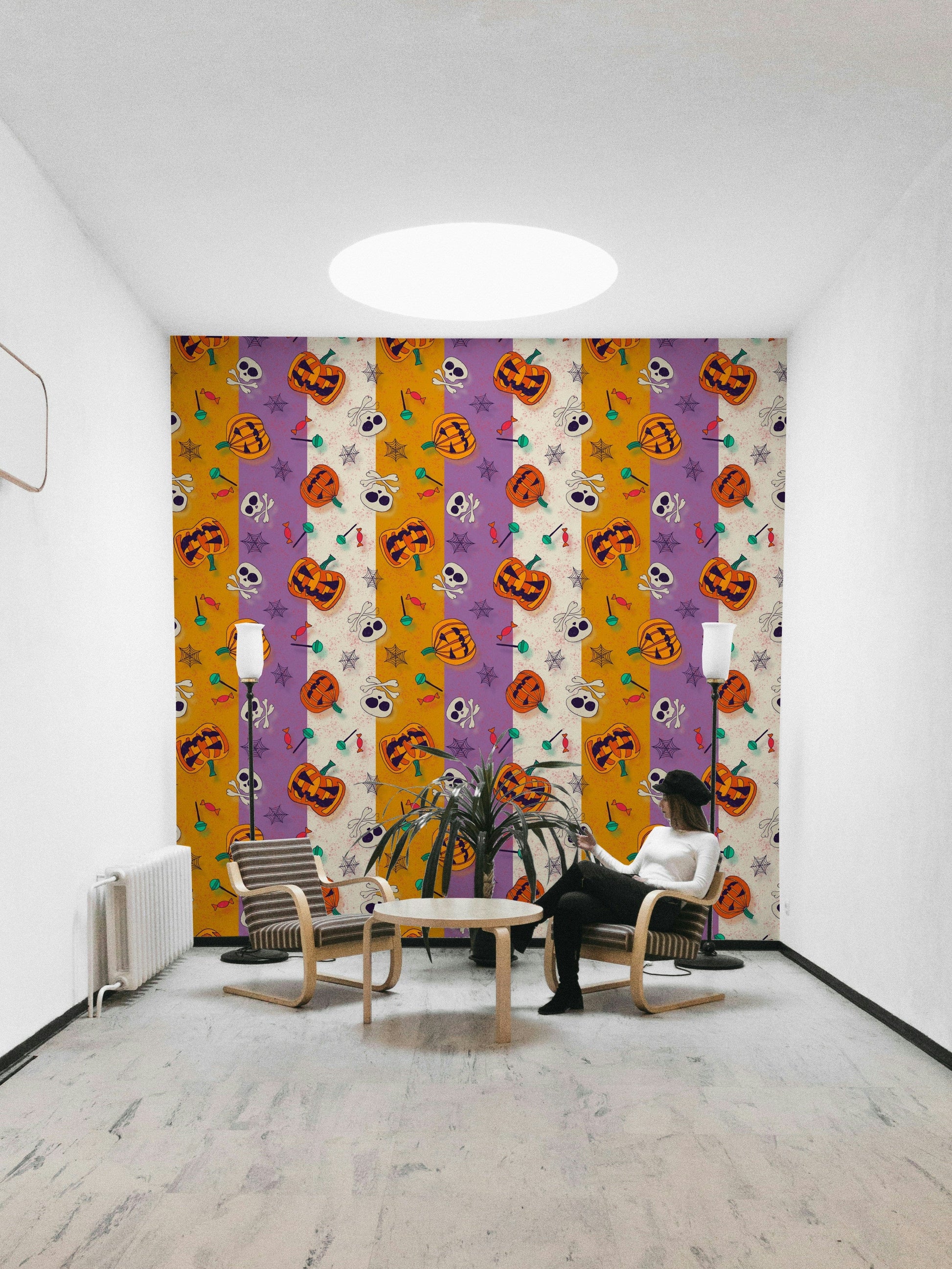 Close up of Festive Halloween Pattern Wallpaper showing bats and stars.