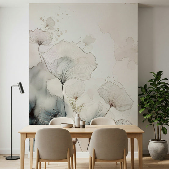 Fine Ink Wash Flowers wallpaper mural with translucent petals and teal wash behind a light wood dining table and beige chairs