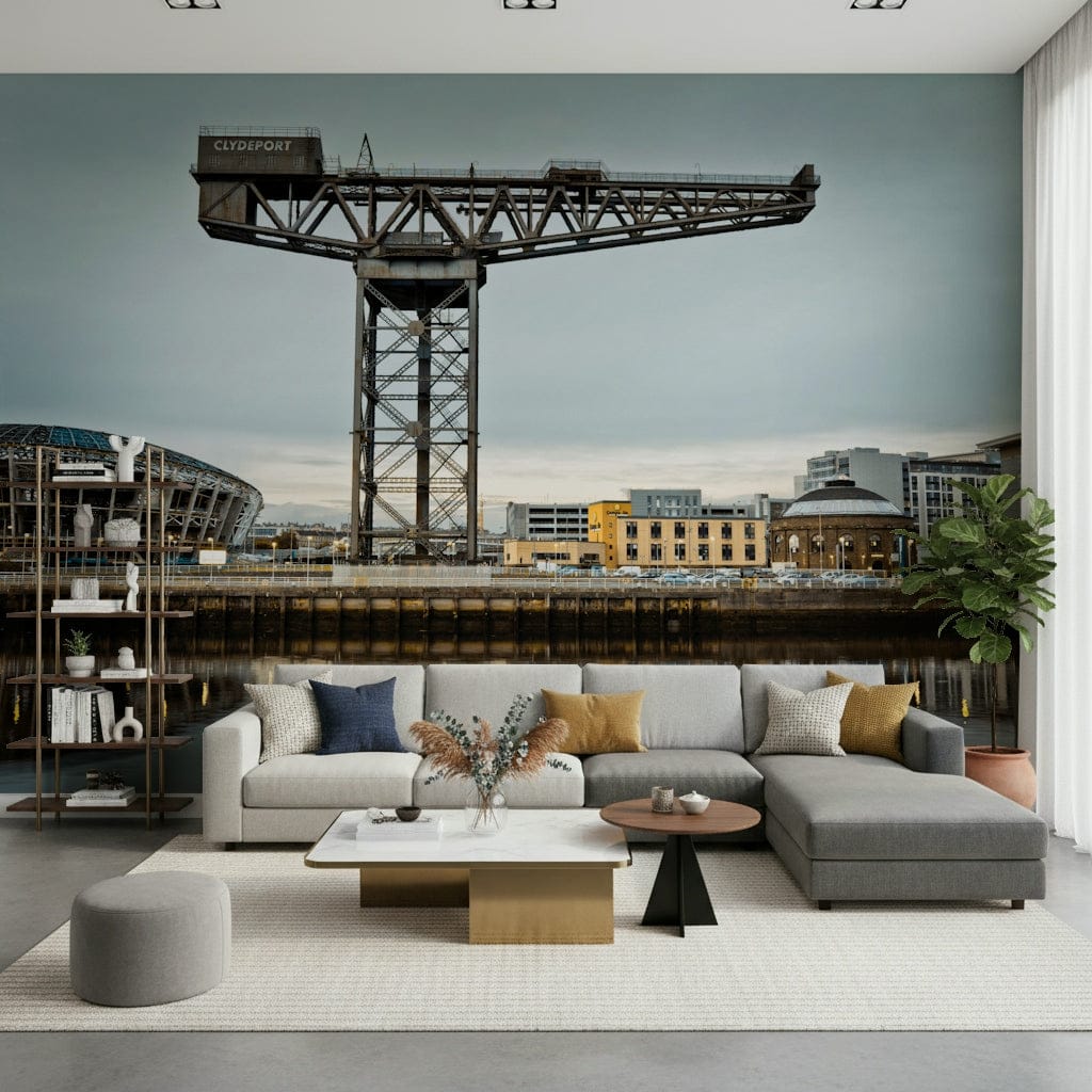 Finnieston Crane wall mural of the Glasgow waterfront above a gray sectional sofa with mustard pillows
