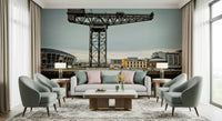 Finnieston Crane wall mural of the Clydeport crane behind a cream sofa flanked by sage armchairs and lamps