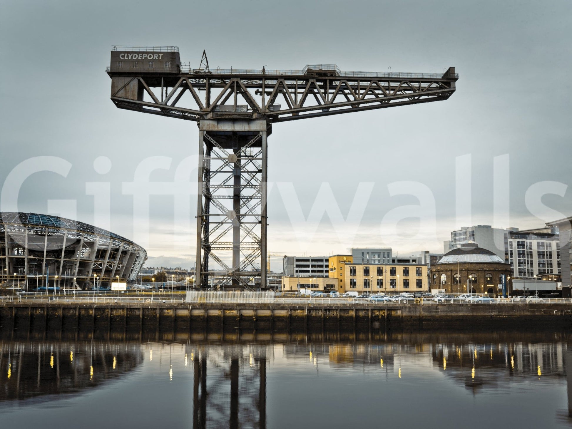 Finnieston Crane mural close-up of the Clydeport crane and Glasgow quay mirrored in the river at dusk