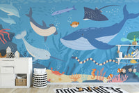 Fish and Marine Life Underwater wallpaper mural as a feature wall in a home office workspace in blue tones