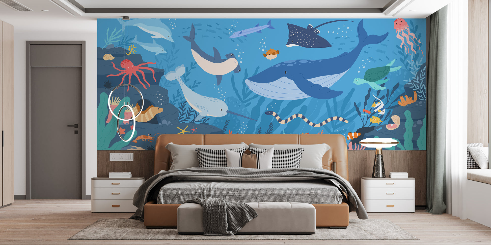 Fish and Marine Life Underwater wallpaper mural as a bedroom feature wall behind the headboard in blue tones