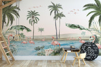 Flamingo oasis with pink background wallpaper with flamingos and palms behind wooden gym rings in a kids playroom