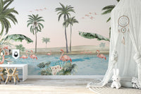 Flamingo oasis with pink background wallpaper of a tropical lagoon behind a white play table and grey canopy in a nursery