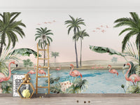 Flamingo oasis with pink background wallpaper of palms and pink flamingos by a lagoon behind a ladder shelf in a kids room
