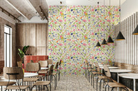 Decorative mural with flowering meadow and buzzing bees in a bright, playful design.