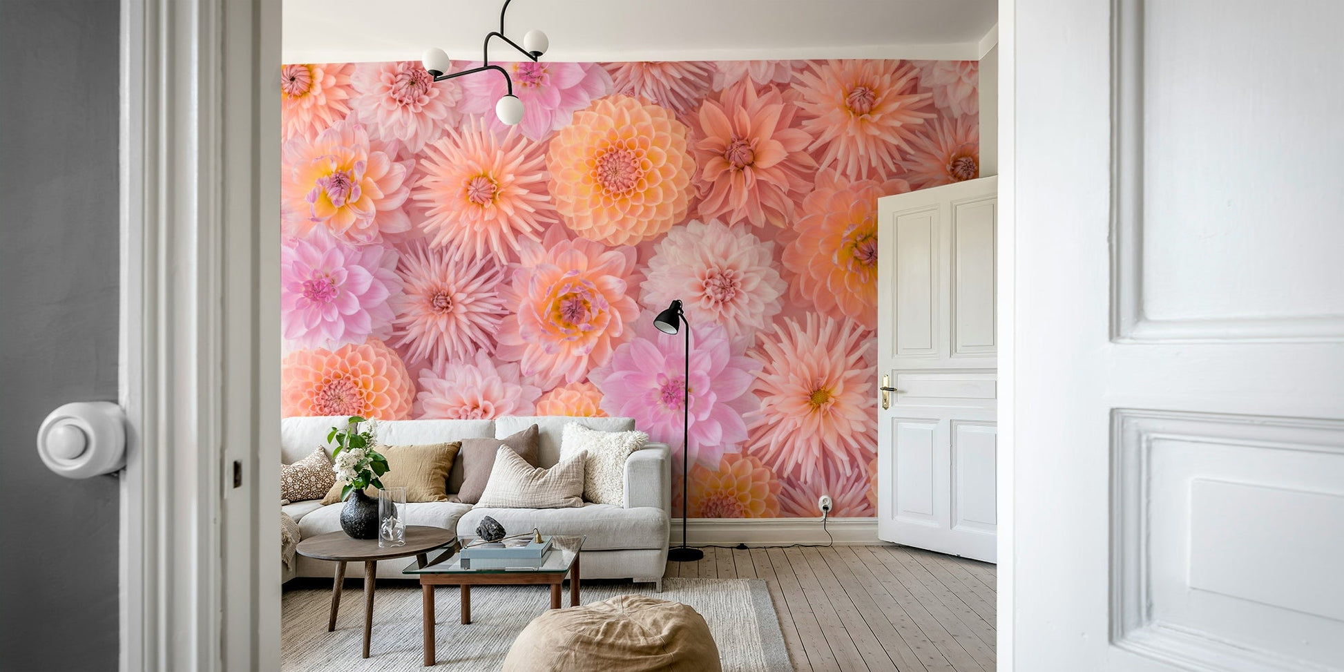 A wall mural with a repeating floral pattern.

