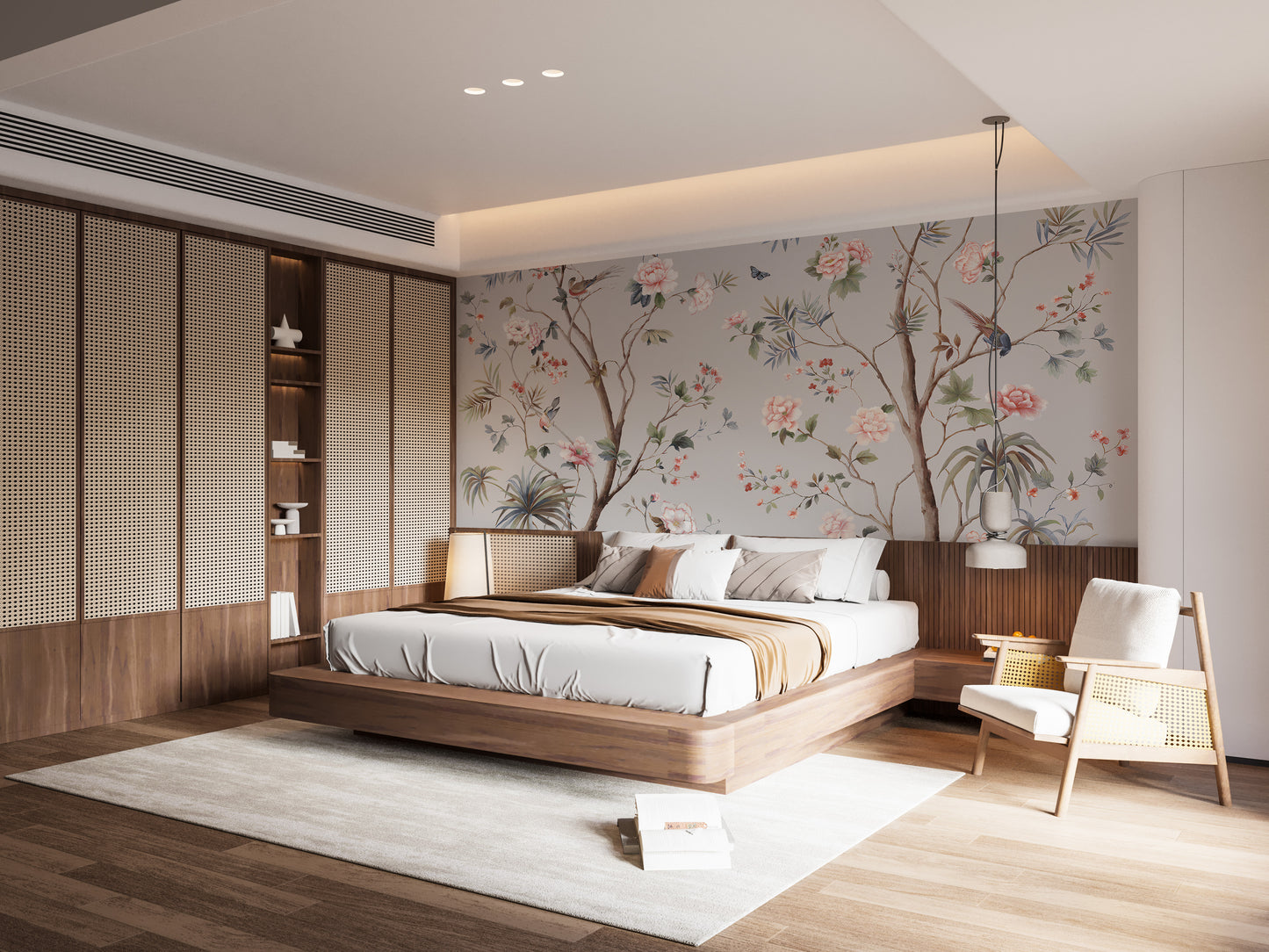 Chinoeserie Floral design wallpaper mural in soft gray behind a low wood platform bed with cane headboard in a bedroom