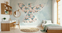 Floral Hummingbird wall mural on pale blue behind a wood desk, mirror and bed in a calm bedroom