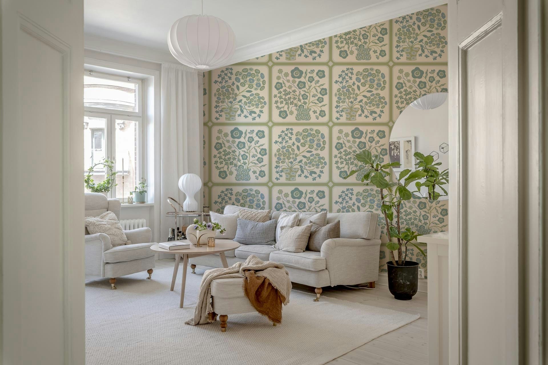 Modern bedroom suite featuring a colorful tile pattern accent wall.