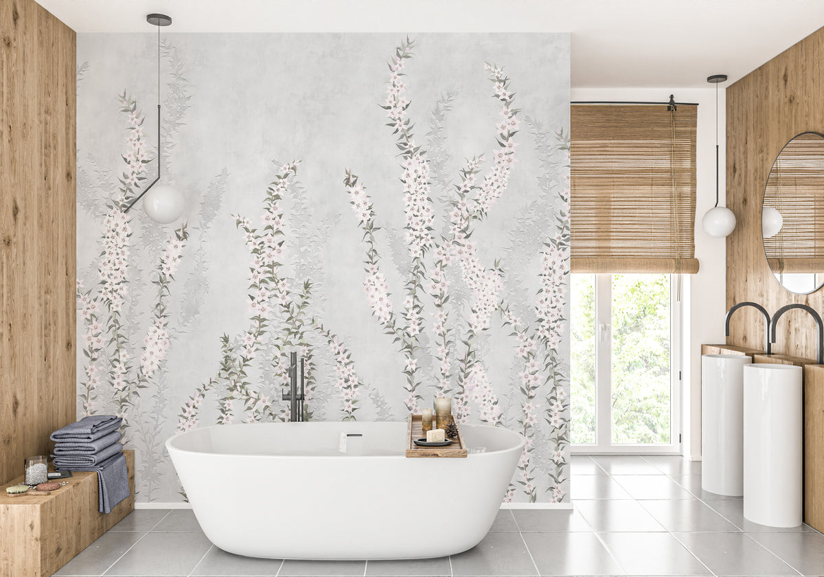White Colour Flower Branches wallpaper mural of pink florals on grey behind a white freestanding tub in a wood-panelled bathroom