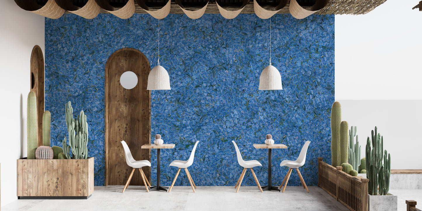Flower Pattern Embroidery Blue wallpaper mural on a cafe wall with white chairs, cactus planters and a wood arch door