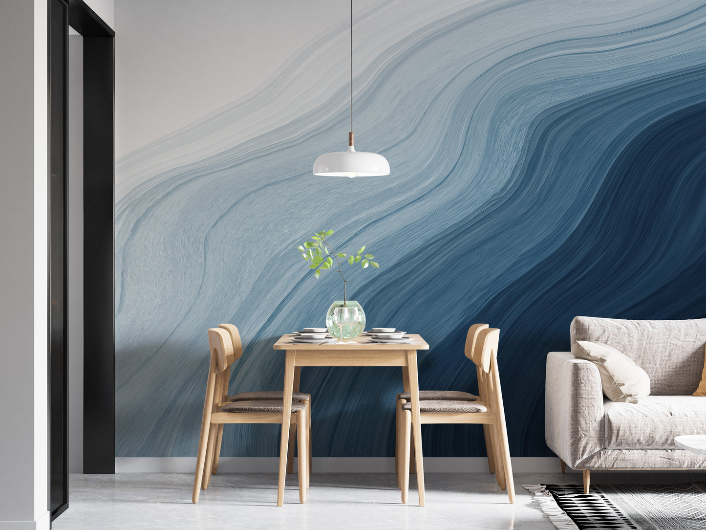 Fluid Blue Gradient Watercolor wallpaper mural behind a wooden dining table and chairs beside a grey sofa