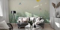 Premium butterfly meadow pastel wall mural in a modern lounge area behind a sleek grey sofa and minimalist decor.