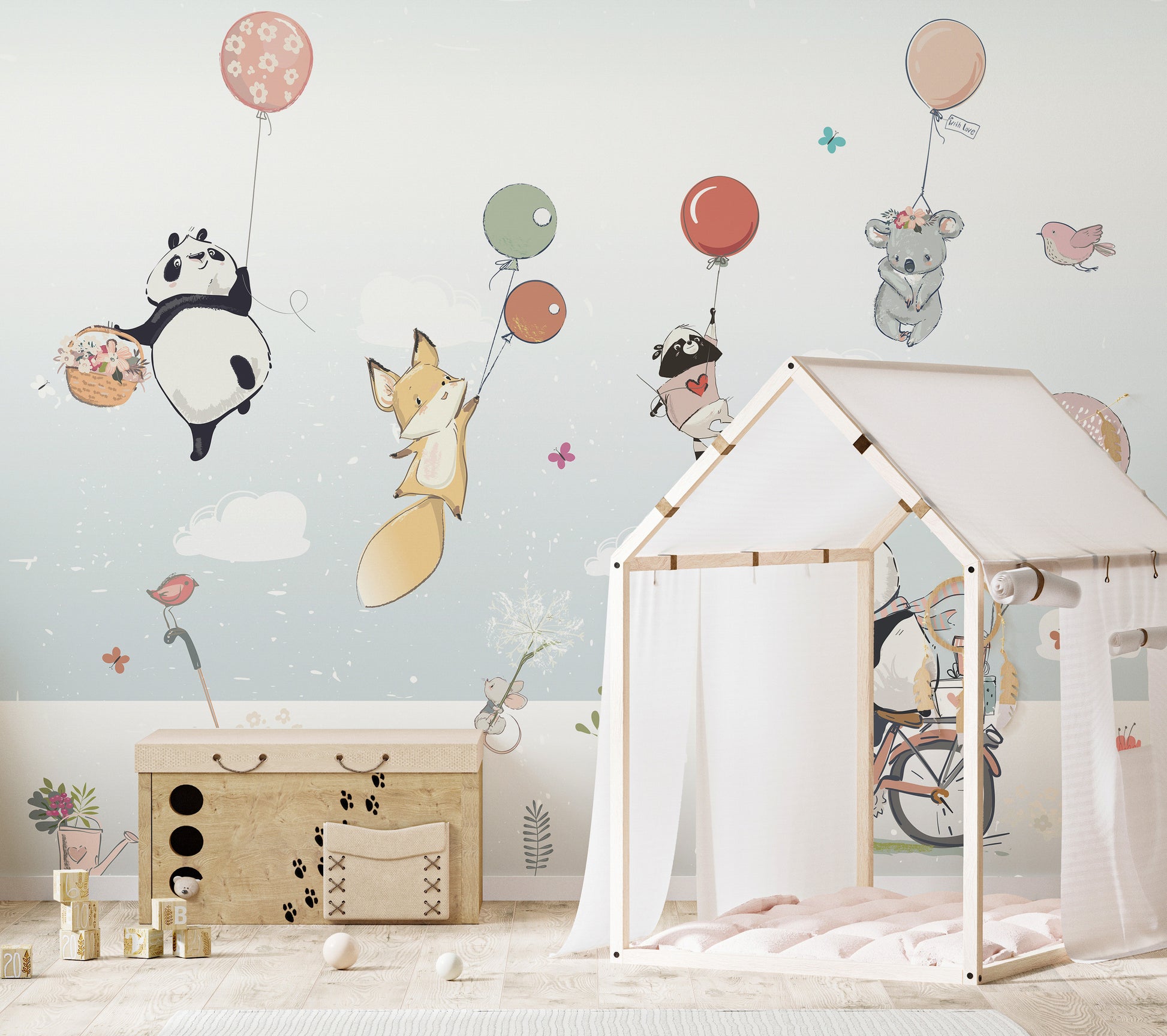 Flying Animals with Balloons mural behind a wood house-frame bed and toy chest in a kids room