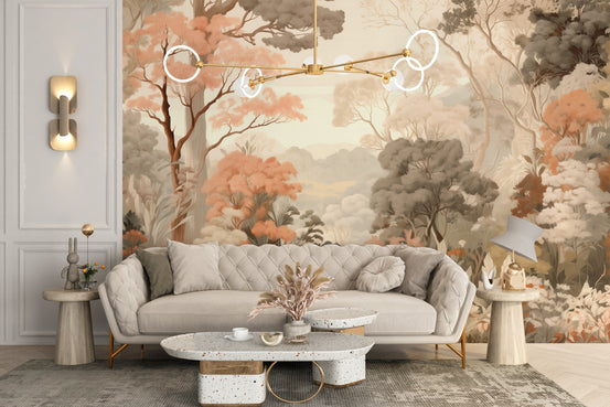 Forest Colorful Trees wallpaper mural in peach and sage tones behind a cream tufted sofa and terrazzo coffee tables