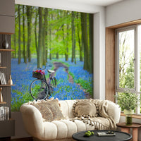 Bike parked in blue flowers Forest Path Discovery mural.
