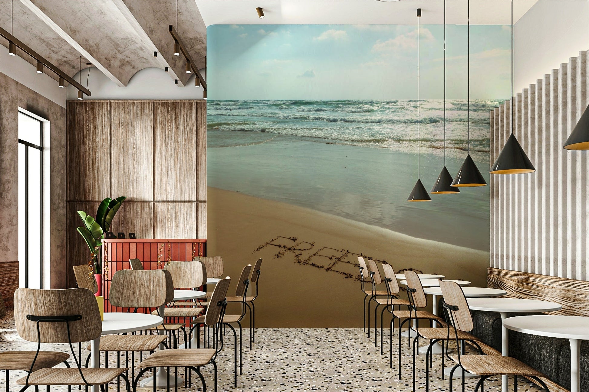 A close-up view shows the fine details of the sand and water.

