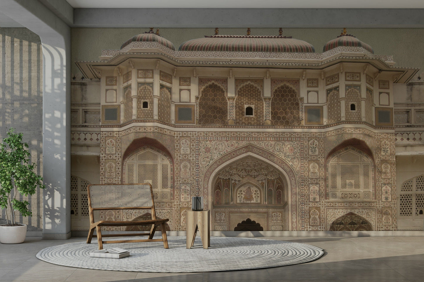 The design features a repeating pattern inspired by the Ganesh Pol gate.

