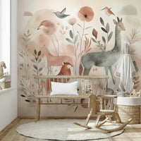 Soft animal designs of deer, owls, and squirrels in woodland mural.

