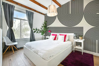 The design features elegant, layered arch shapes creating an illusion of depth.

