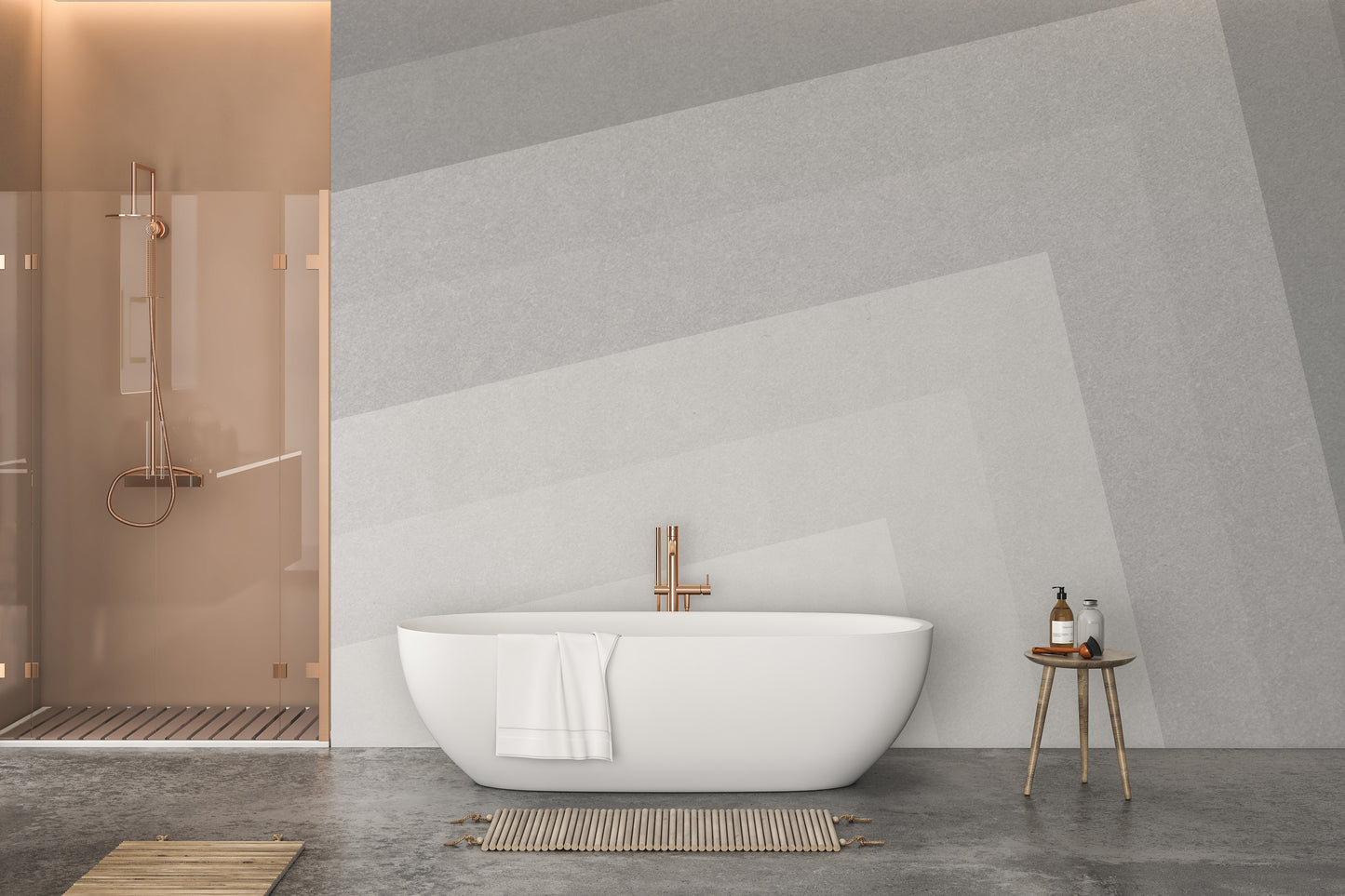 Geometric gray ombre layered wallpaper mural in soft greys behind a freestanding white tub in a modern bathroom