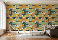 Geometric circle pattern wallpaper in teal and mustard