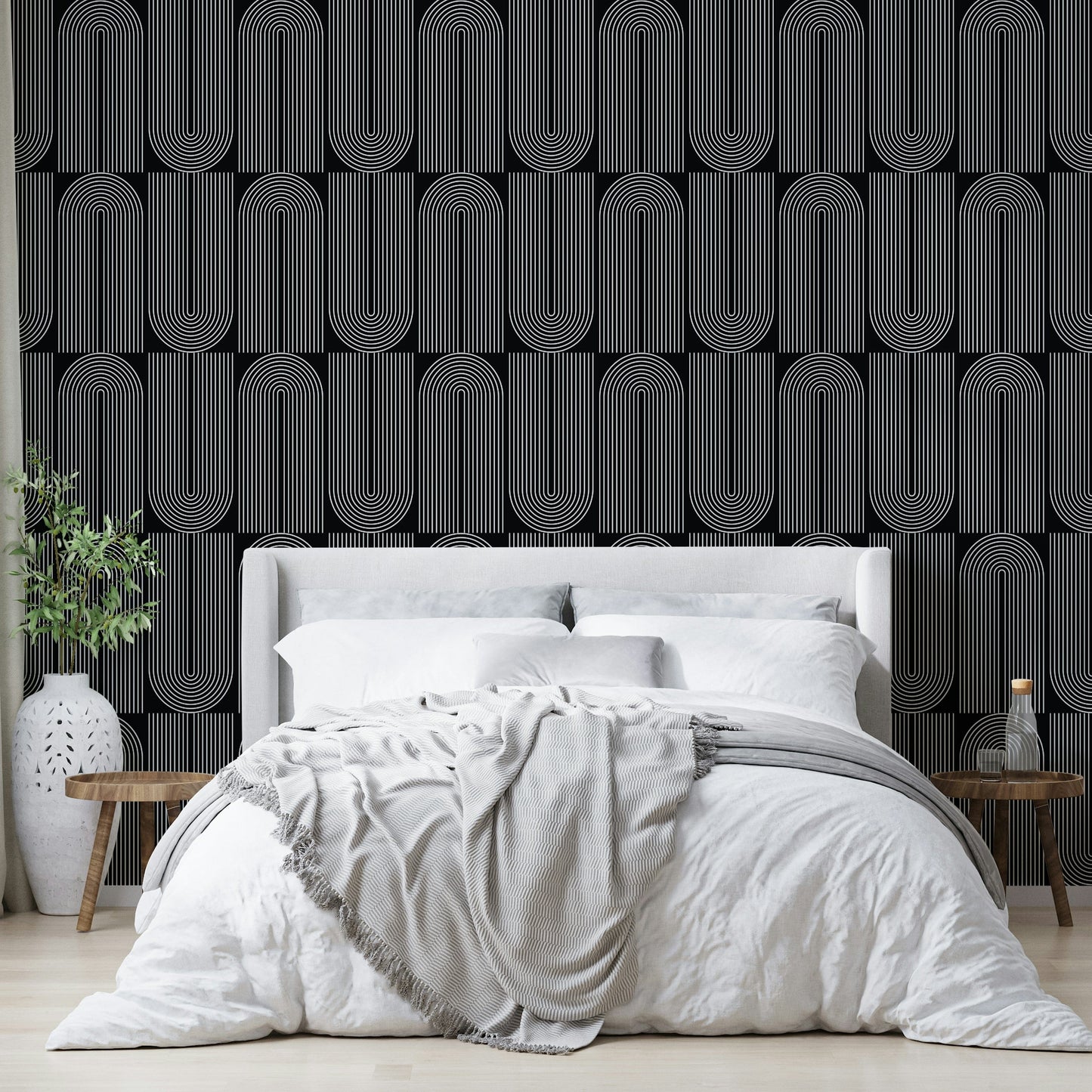 Bold dark background outlined wallpaper with arch motifs.