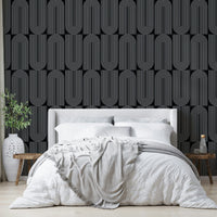 Bold dark background outlined wallpaper with arch motifs.