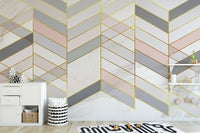 Geometric Shape Golden Effect Marble wallpaper mural in pink and grey behind a white dresser in a kids room