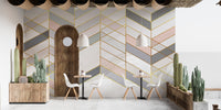 Geometric Shape Golden Effect Marble wallpaper mural behind white cafe chairs and cactus planters