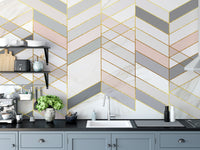 Geometric Shape Golden Effect Marble wallpaper mural above blue-grey cabinets and a sink in a kitchen