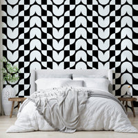 Stylized art deco flower motif wallpaper roll in cream.
