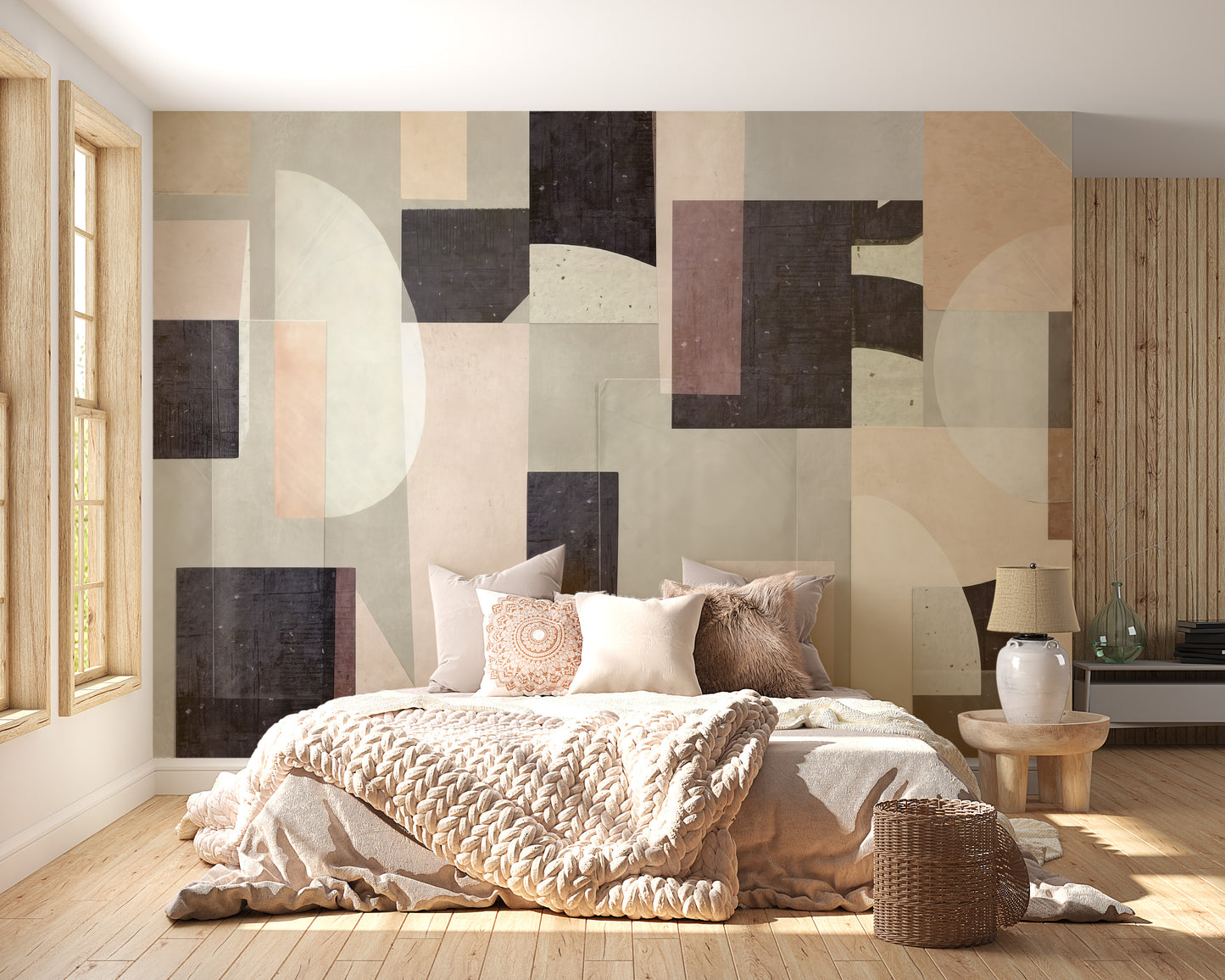Modern Abstract wallpaper mural in beige and dark geometric blocks behind a cozy bed with knit throw and wood-panelled wall
