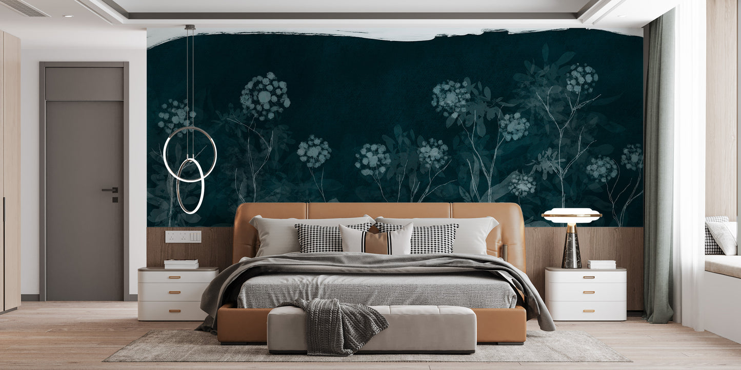 Midnight Botanical wallpaper mural in dark teal with pale flowers behind a tan leather bed in a modern bedroom