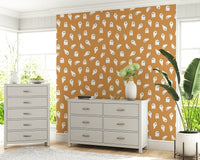 Soft, friendly ghost figures floating across a minimal spooky design.